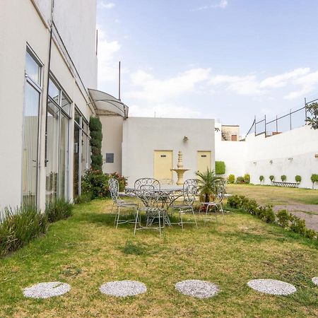 Capital O Hotel Villa Monini 普埃布拉 外观 照片