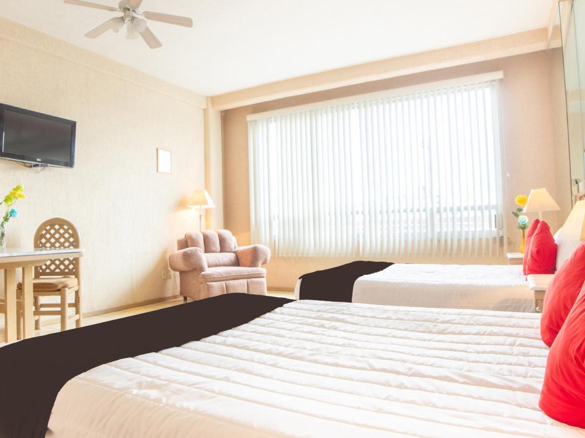 Capital O Hotel Villa Monini 普埃布拉 外观 照片