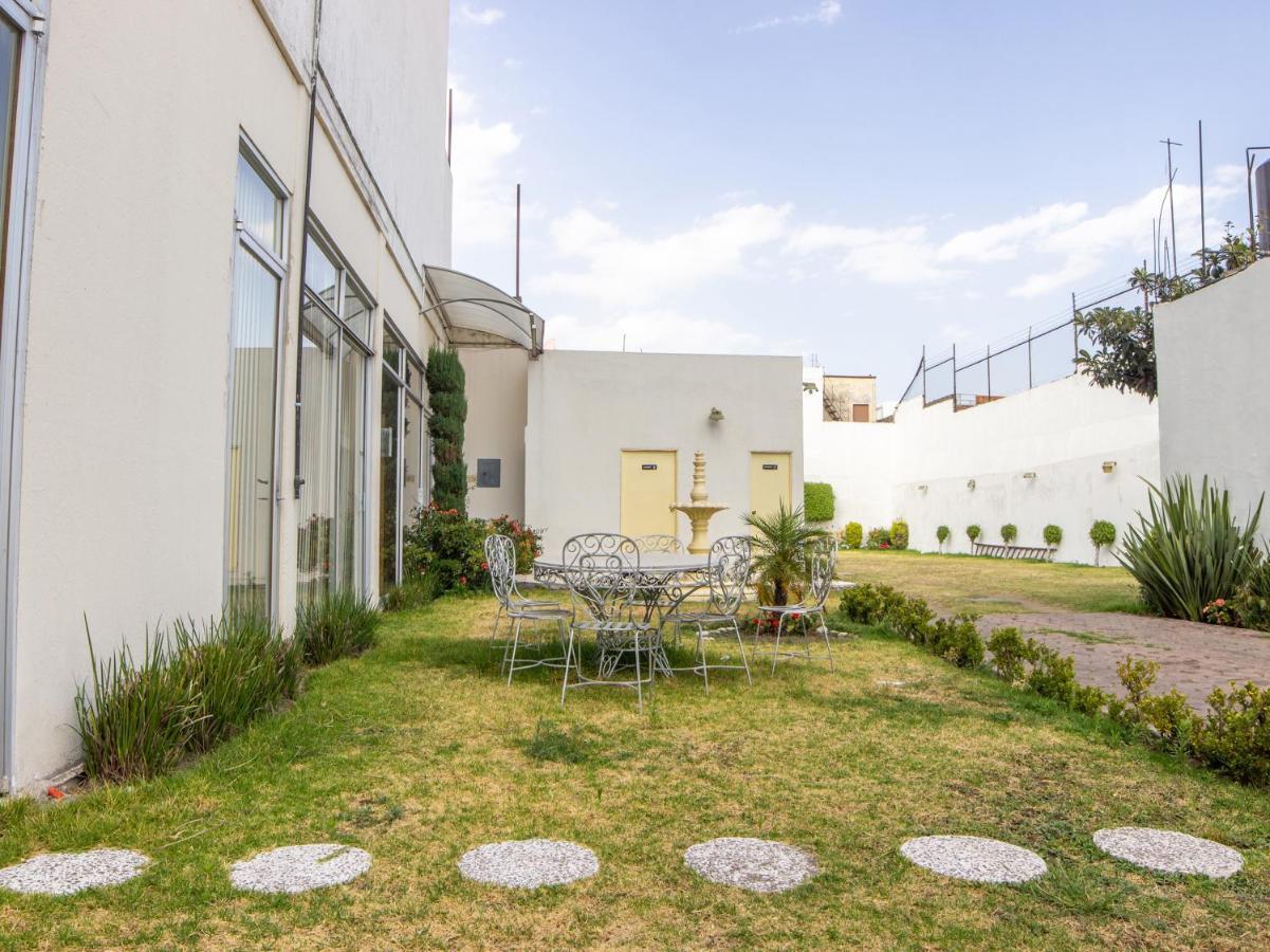 Capital O Hotel Villa Monini 普埃布拉 外观 照片