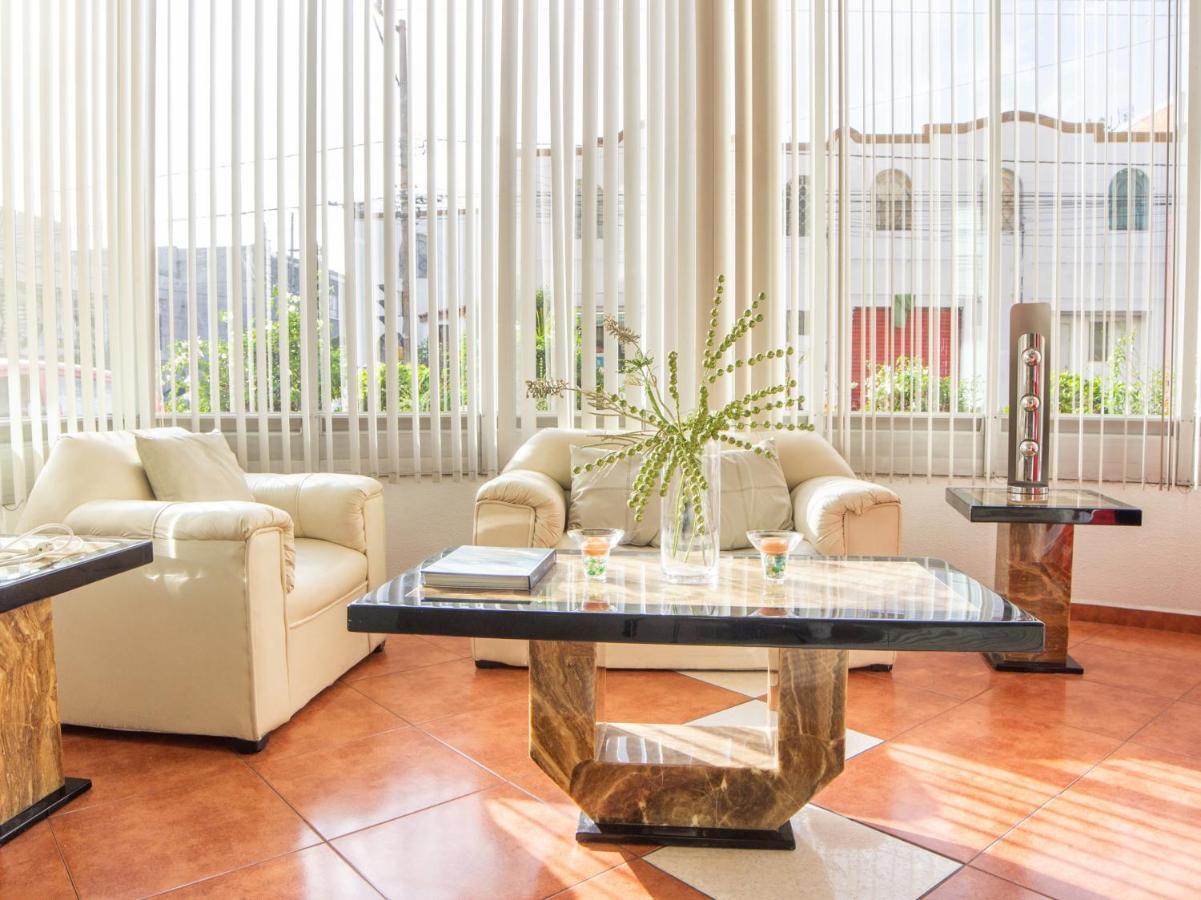 Capital O Hotel Villa Monini 普埃布拉 外观 照片